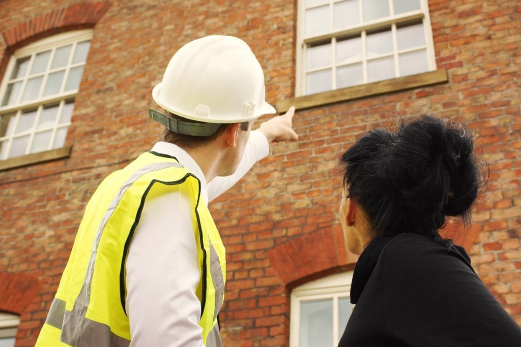 Building surveyor conducting a full Level 3 structural survey in a Victorian property
