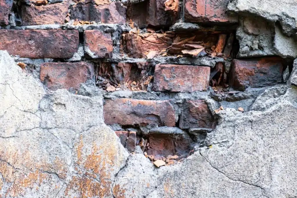 Close-up of structural crack in a Surrey brick wall indicating possible subsidence